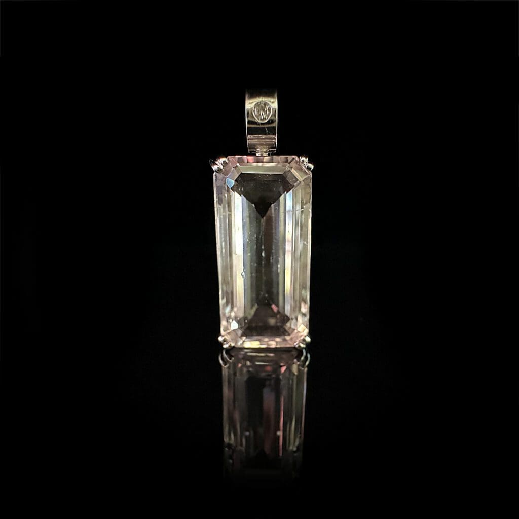 Kunzite pendant with diamond bale