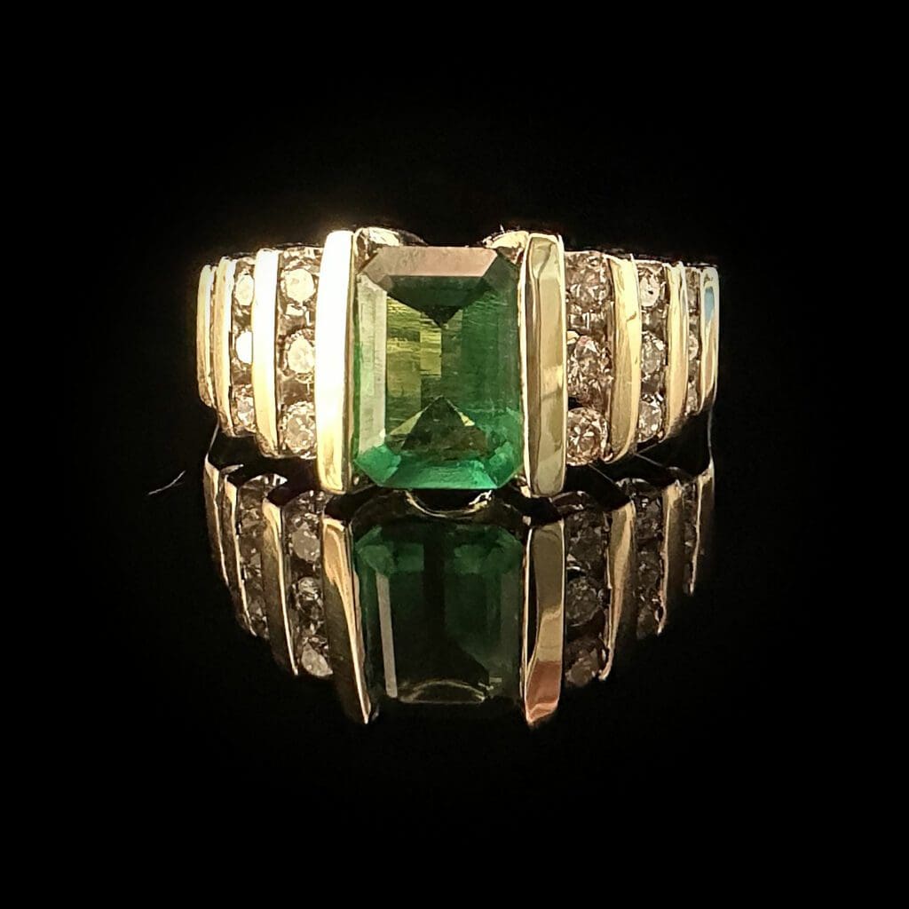 Emerald cut emerald ring