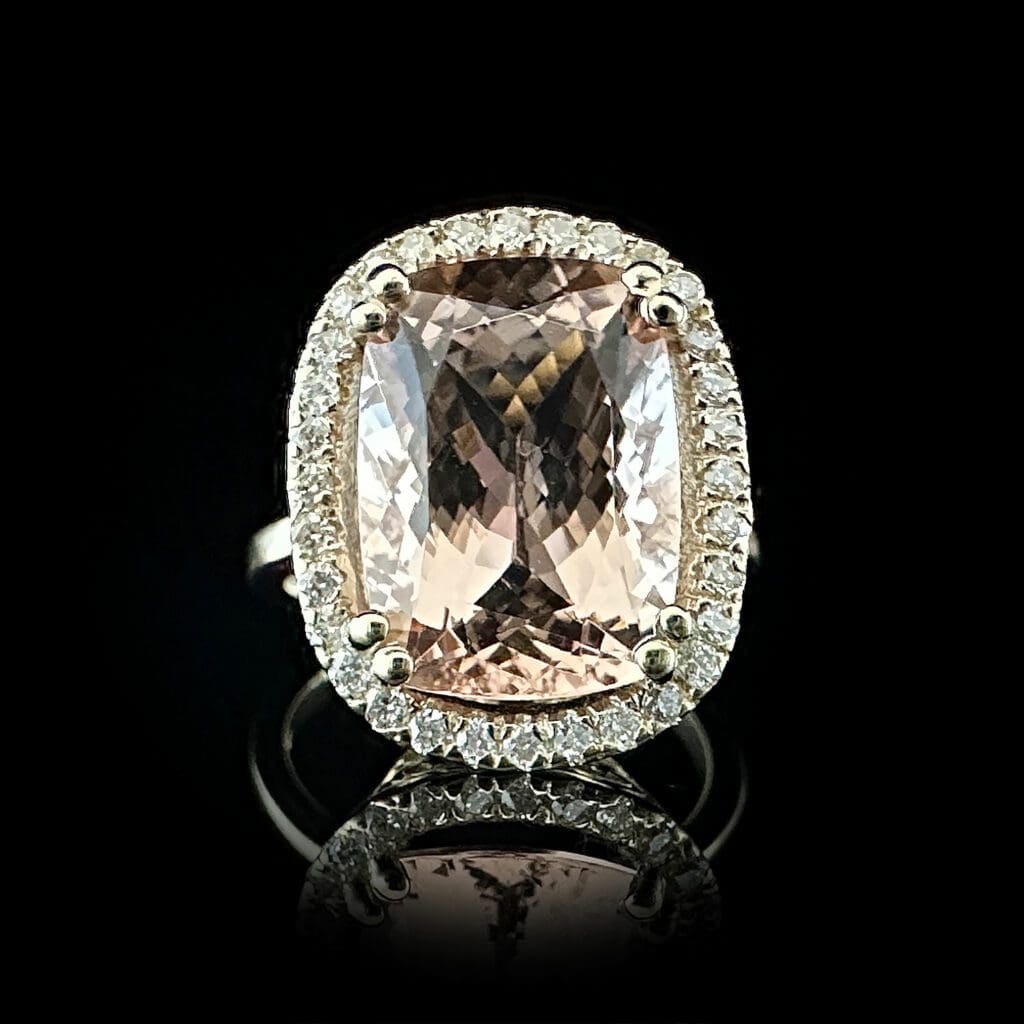 Cushion shaped morganite and diamond yellow gold ring