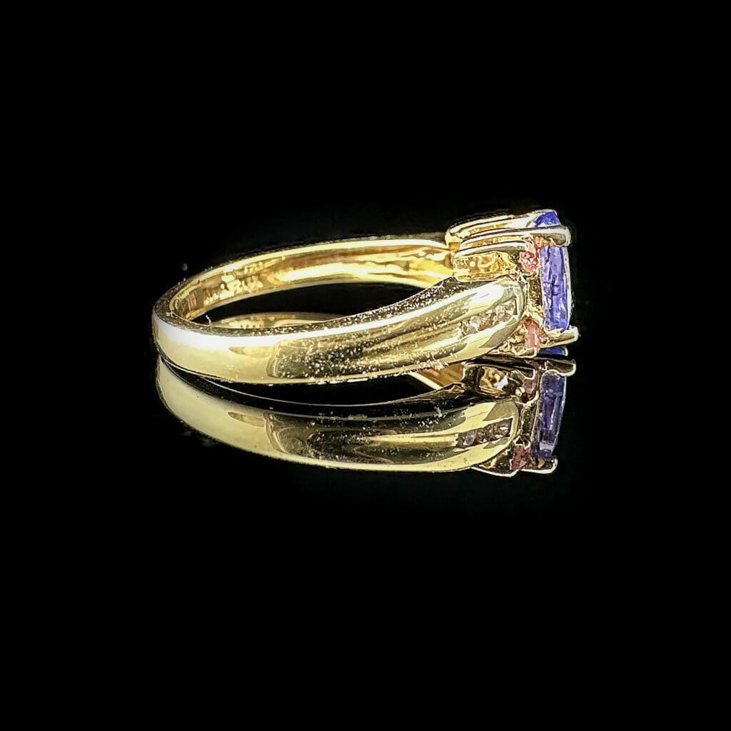 Oval tanzanite, four pink sapphires, diamonds & yellow gold ring - Image 4