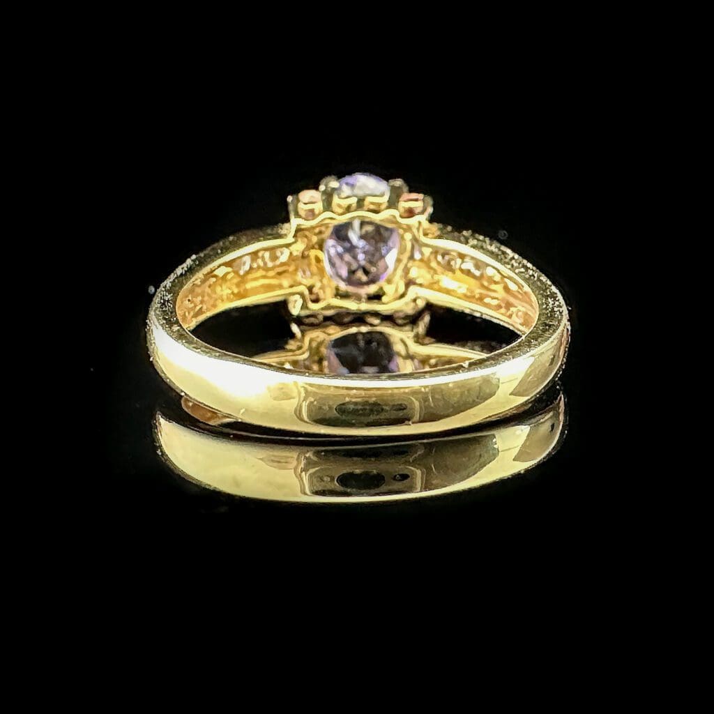 Oval tanzanite, four pink sapphires, diamonds & yellow gold ring - Image 5