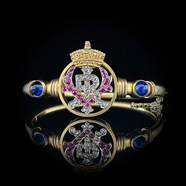 Antique English gold bracelet with diamonds, sapphires and rubies