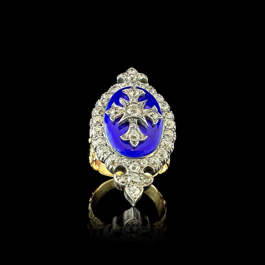 Fine antique diamond and enamel marquise fleur de lys ring